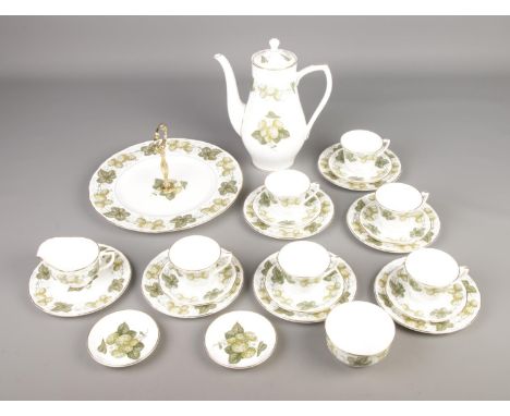 A Royal Worcester coffee set in The Worcester Mathon Hop design, includes coffee pot, sugar bowl, coffee cups, cake stand etc