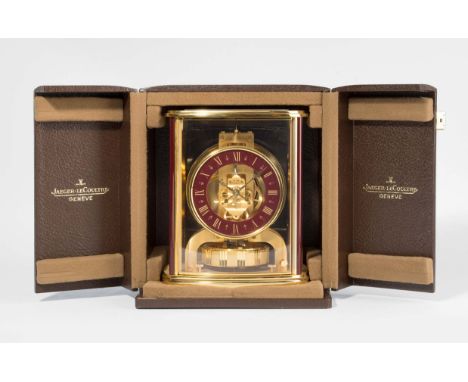 Tischuhr Jaeger-LeCoultre "Atmos"Modell "Cintrée", 1979-84, Referenz 5854. Allseitig verglastes, leicht elliptisches, vergold