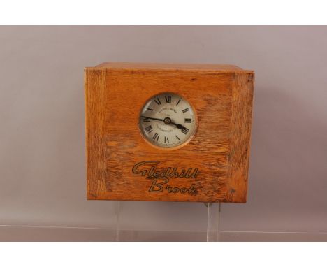 A vintage Glenhill Brook clocking in or time recording wall clock, 30cm wide, appears to run but needs some attention