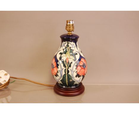 A modern Moorcroft Pottery lamp base, 27cm including wooden base and light fitting