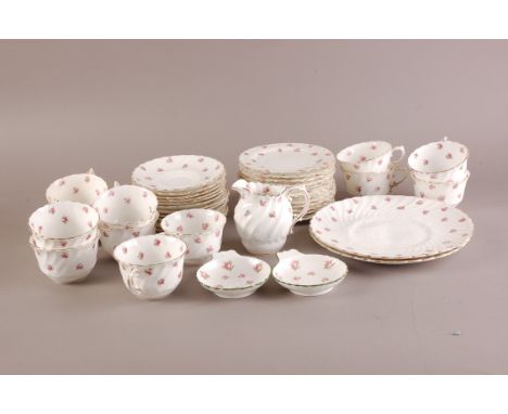 A mid 20th century Crown Staffordshire Porcelain Rose pattern tea service, setting for 12 but lacks sugar basin