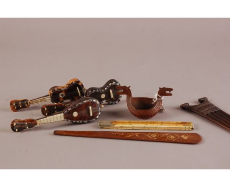 A collection of 19th and 20th Cenutyr treen and other collectables, to include two guitars and a lute of tortoiseshell and mo