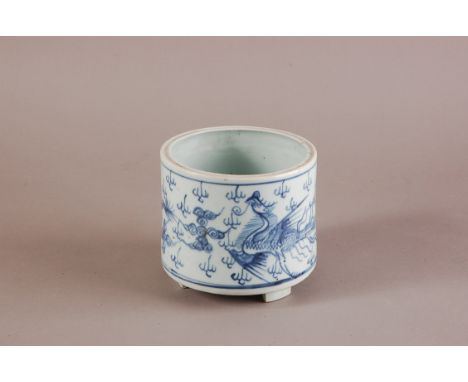 A 19th century Chinese blue and white porcelain planter, 11.5cm, short cylindrical form on three supports and decorated two d