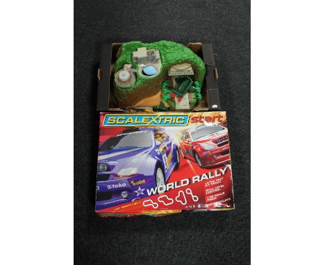 A boxed Scalextric World Rally together with a further box containing a Thunderbirds Tracy Island model with vehicles 