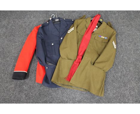 An army tunic, an ambulance jacket and a formal military jacket 