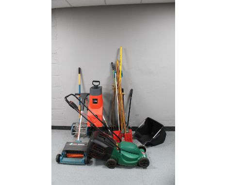 A quantity of gardening equipment to include a Qualcast electric lawn mower with lead, Black &amp; Decker lawn raker, Soverei