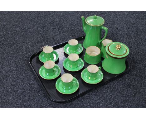 A tray containing a sixteen-piece Carlton ware green lustre tea service 