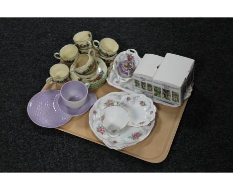 A tray containing a five piece Royal Albert Tranquility tea for one, two boxed Lilliput cottages, fourteen piece Royal Cauldo