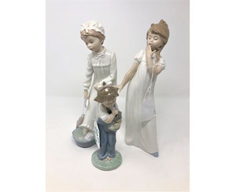 A Nao china figure : Young girl in nightdress washing her feet, height 28 cm, together with two further Nao china figures bot