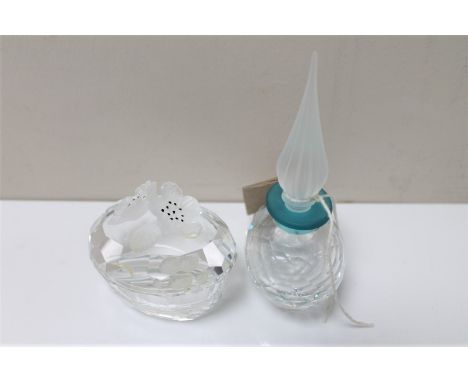 A Swarovski crystal perfume bottle together with a Swarovski crystal lidded trinket box 