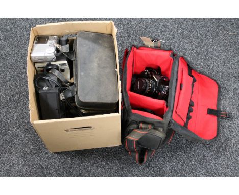 A camera bag containing a Chinon camera with lens and flash, together with a further box of various cameras and accessories 