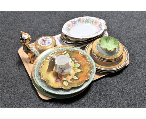 A tray containing a Royal Crown Derby milk jug together with a collection of wall plates, shallow dishes and sandwich plates 