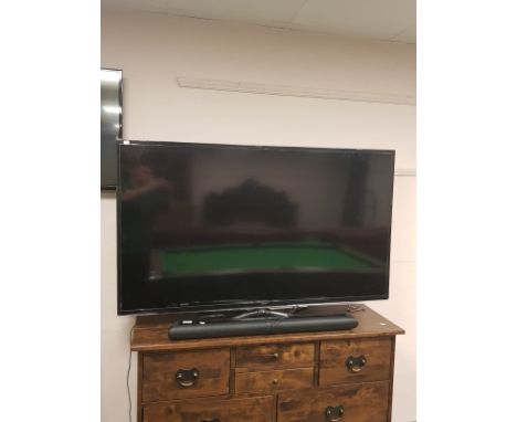 A Samsung 60" smart TV model UE60H6200AK, with Goodmans 50W Stereo Bluetooth Wireless Soundbar, with remote