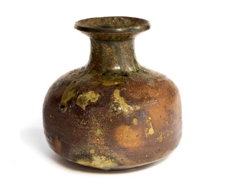 Janet Leach, a St Ives studio pottery vase, squat onion form, woodfired rust and celadon drip glaze, impressed seal marks, 12