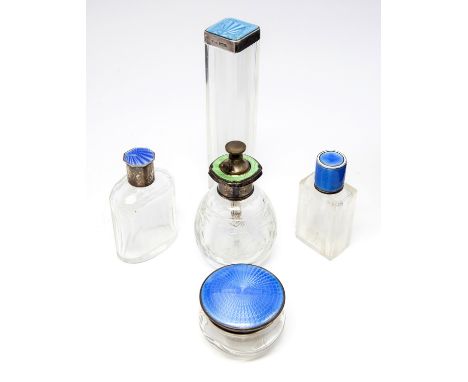 Five Art Deco enamelled silver topped glass bottles, blue and green guilloche enamel, various dates and makers (5)