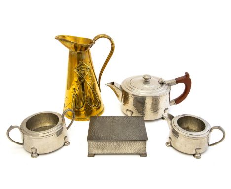 An Art Deco pewter three piece tea set, planished, stepped cylinder design on squat pad feet, My Lady, 1336, together with a 