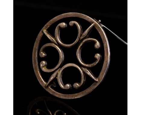 Ola Gorie, a Scottish silver brooch, Celtic style torque and spear motifs, Edinburgh 1973, 4.2cm diameter, 0.41ozt