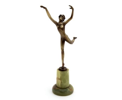 Josef Lorenzl, an Art Deco bronze figure of a nude dancer, both arms raised, leg back, circa 1925, on onyx base, signed indis