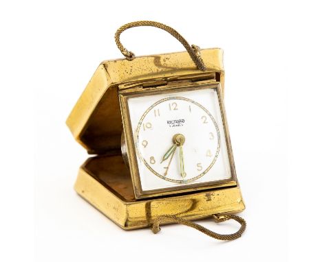 A novelty alarm clock, circa 1950s in the form of a handbag, Richard, seven jewel movement, engine turned gilt case with mesh