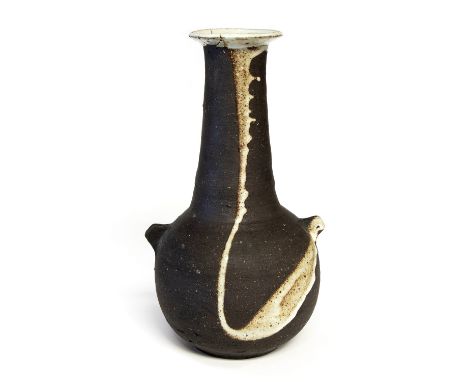 Janet Leach, a St Ives studio pottery vase, bulbous form with wing handles, black stoneware with with celadon interior and ab