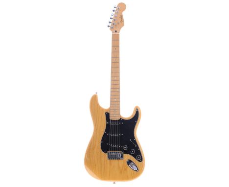 2006 Fender Lite Ash Stratocaster electric guitar, made in Korea, ser. no. 06xxxx5; Body: natural finish, ding to top otherwi