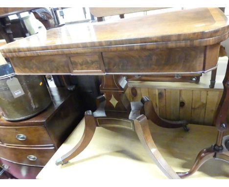A Regency mahogany, flame mahogany and satinwood cross banded D-shaped fold-over baize lined card table, having a swivel acti