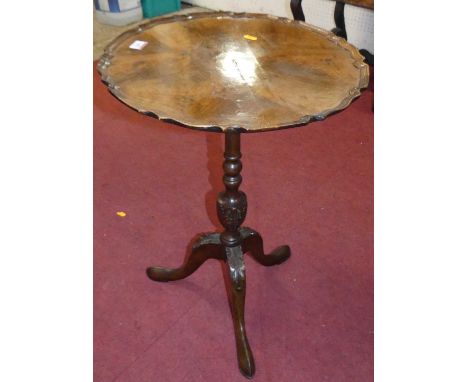 A mahogany and flame mahogany piecrust fixed top pedestal tripod occasional table, dia. 44.5cm 