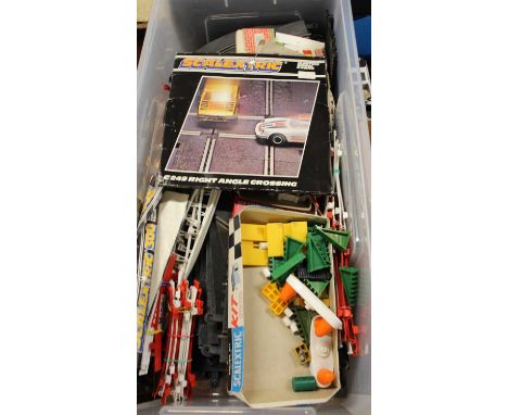 A large collection of Scalextric related accessories and track