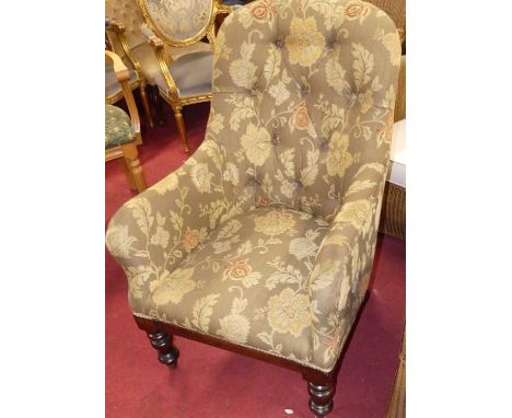 A mid-Victorian mahogany framed and later floral needlework button upholstered tub armchair on turned forelegs, width 63cm