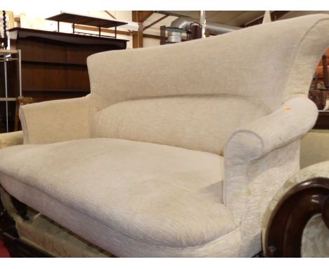 A circa 1900 and later pale floral fabric upholstered two-seater parlour sofa, raised on ebonised ring turned forelegs, width