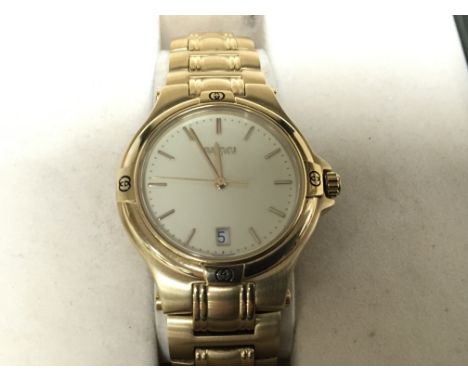 A Gents 18carat  Gold plated Gucci Watch with a pale yellow dial serial and model number 9240M 0004507 in orgional box with e