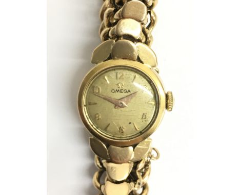 A ladies 18ct gold Omega automatic wristwatch. This petite example has been in the vendors family since new and was specially