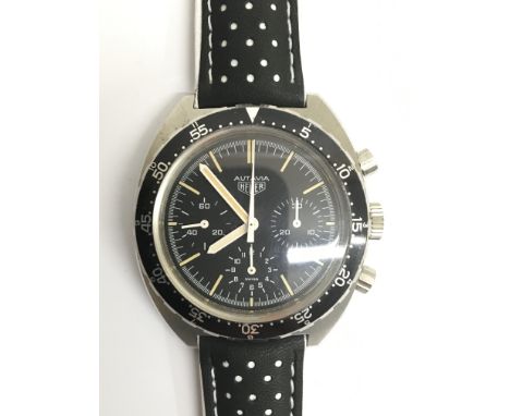 A rare 1970s gents Heuer Autavia manual wind wristwatch, reference number 7738. This exciting timepiece has a black dial with