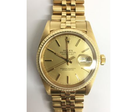 An 18ct gold Rolex Datejust gents wristwatch in original Rolex box, with paperwork. This superb automatic chronometer has a g