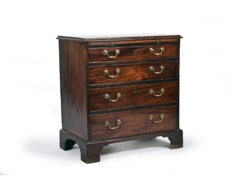 A small, well proportioned, George III mahogany chest of drawers, the rectangular moulded top above a brushing slide, over 4 