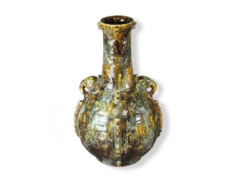 An unusual Royal Worcester Aesthetic Movement vasecirca 1875of elephant twin-handled form, decorated in mottled green and bro