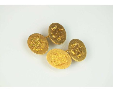 A pair of yellow metal cufflinks, each with engraved monogram, the reverse stamped '18ct', weight approx 15.5gPart of a Heref