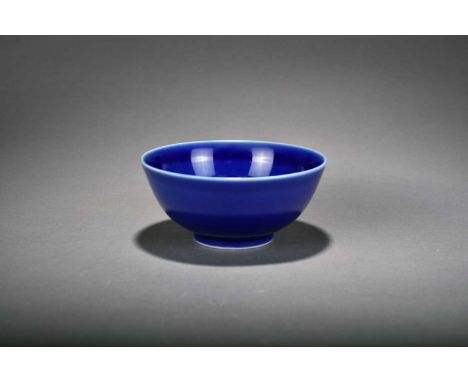 A Chinese monochrome blue glazed bowl, Guangxu six-character mark and of the periodOf plain rounded form with short foot ring