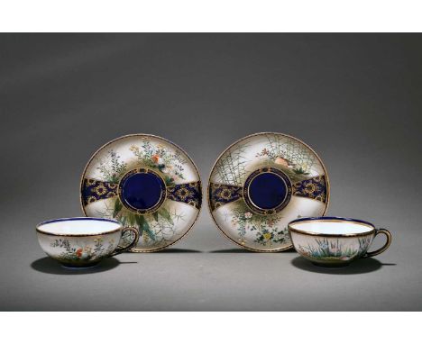 A pair of Japanese Satsuma teacups and saucers, Kinkozan, Taisho periodThe first decorated with scenes of water birds amid gr