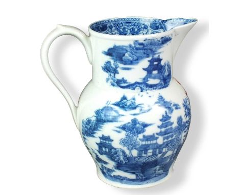 A good John Rose, Coalport porcelain jug circa 1796-1800 transfer-printed in underglaze blue with a typical Chinese landscape