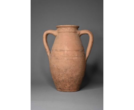 A twin handled Turkish/Anatolian (Asia Minor) pottery jar, possibly 1st-2nd century A.D.Of ovoid form with twin loop handles 