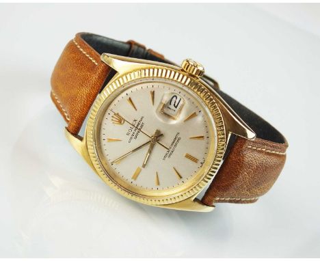 A Gentleman's 14ct gold Rolex Oyster Perpetual Datejust wristwatch, automatic movement, the silvered dial with gold batons, s