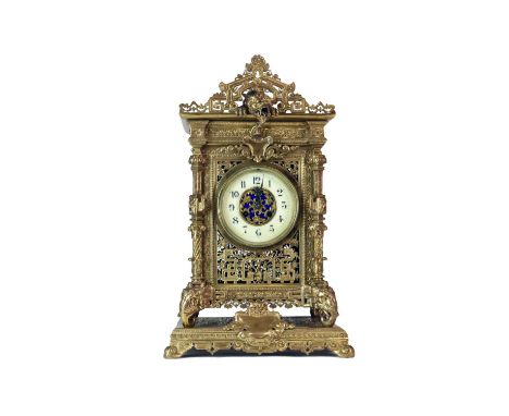 A large and impressive gilt brass bracket clock in the Chinese taste by Herbert Mason, circa 1887The openwork cast case of re