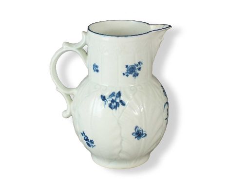 A Worcester cabbage leaf mask-head jugcirca 1770-80transfer-printed in underglaze blue with the 'Gillyflower' patternhatched 