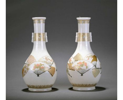 A pair of Japanese Satsuma arrow vases, Meiji periodOf bottle form with twin 'bamboo' handles and everted rims, decorated wit