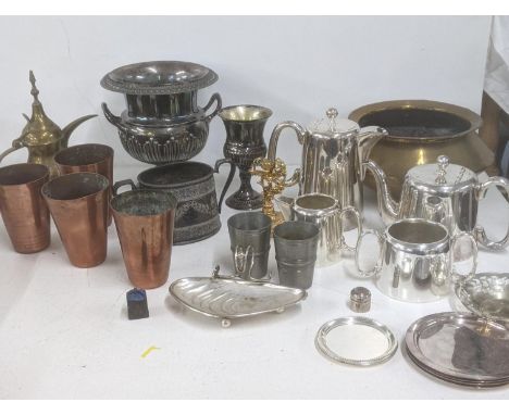 A selection of metalware mostly silver plated items to include a Walker and Hall twin handled urn, a four piece tea service, 