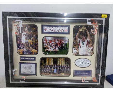 A framed and glazed England Rugby World Champions montage signed by Martin Johnson, with Lashings certificate of authenticity