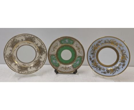 Three decorative wall plates to include an early 20th century Mintons Green, gilt and enamel plate decorated with repeating e
