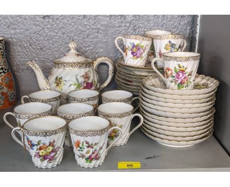 A Dresden tea service to include a teapot, sugar bowl, milk jug, saucers and other items Location: 9.2 If there is no conditi