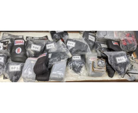 Boxing related items to include boxing bag, ceiling hanging mounts and chains, groins protectors, sparring gloves and trainin
